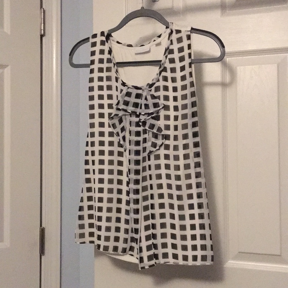 Ruffle sleeveless blouse